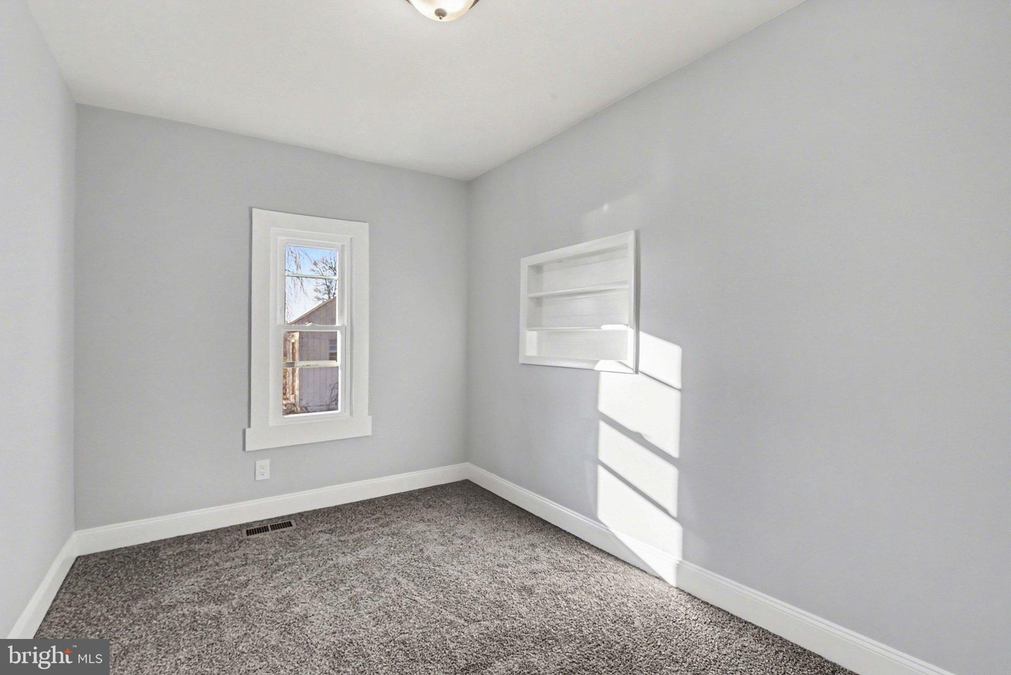 210 Beaver Road Harrisburg, PA 17112 - Photo 18 of 32 an empty room with windows