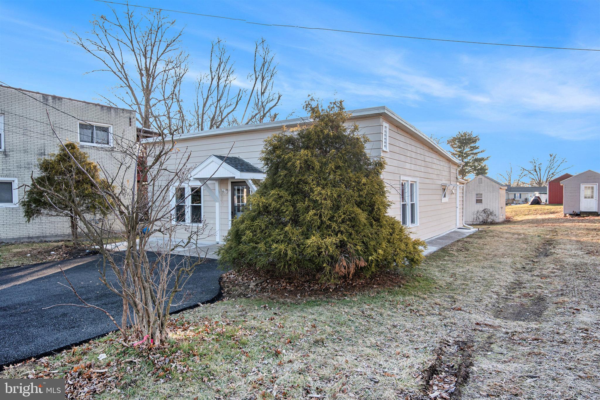 210 Beaver Road Harrisburg, PA 17112 - Photo 3 of 32 a view of a house with a backyard