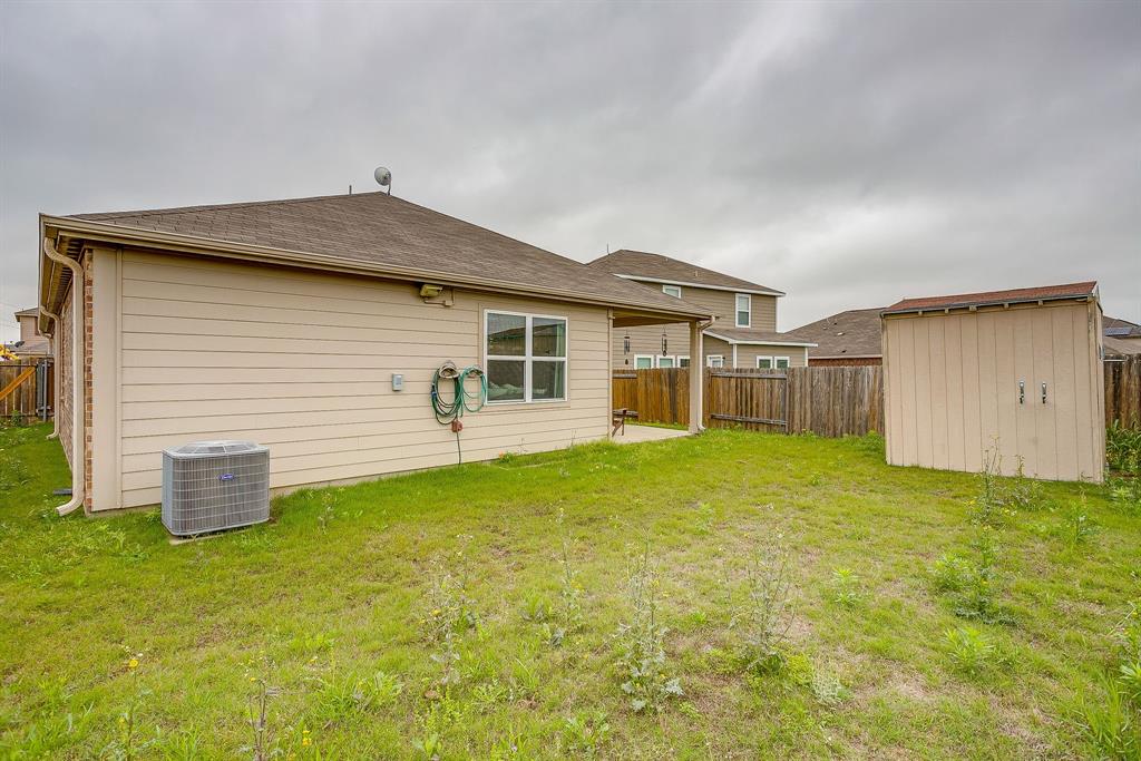 136 Kennedy Drive Venus, TX 76084 - Photo 22 of 27 a front view of house with yard and porch