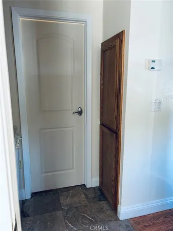 a bathroom with a sink a toilet a mirror and vanity