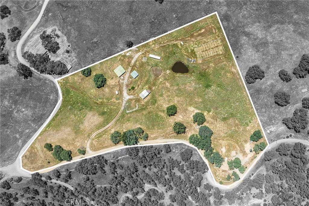 19511 Oak Haven Road Lower Lake, CA 95457 - Photo 3 of 50 House is at top of property (bottom right corner) with out buildings below (upper middle) and trailer and greenhouse structures beyond (upper right)