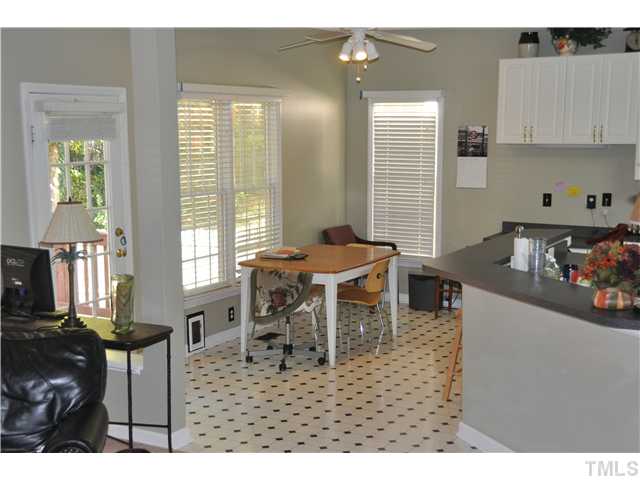 12321 Amoretto Way Raleigh, NC 27613 - Photo 7 of 9 Kitchen and breakfast room from family room