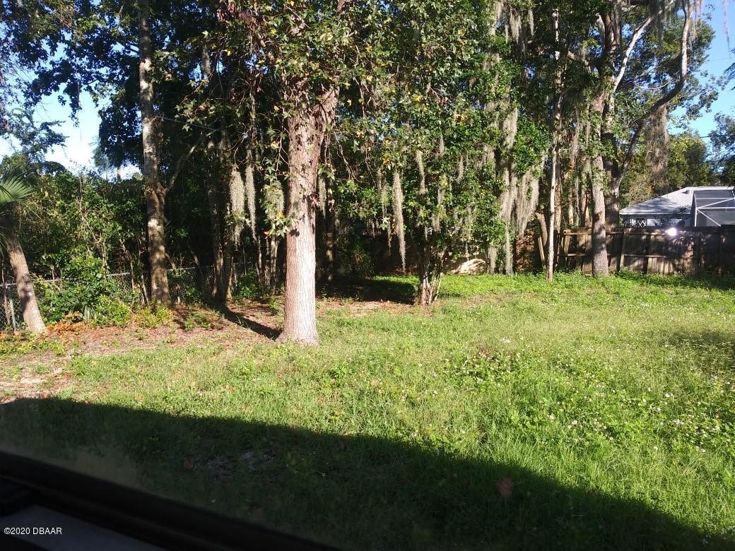 939 West Granada Boulevard Ormond Beach, FL 32174 - Photo 13 of 14 a view of outdoor space with deck