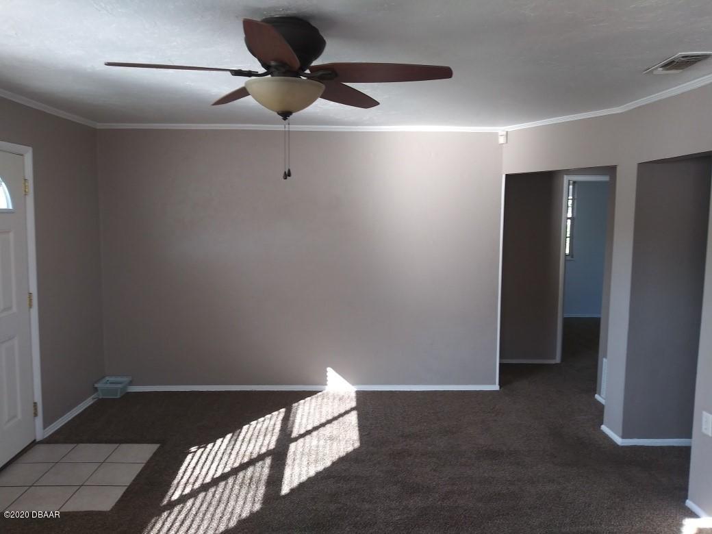 939 West Granada Boulevard Ormond Beach, FL 32174 - Photo 6 of 14 a view of an empty room