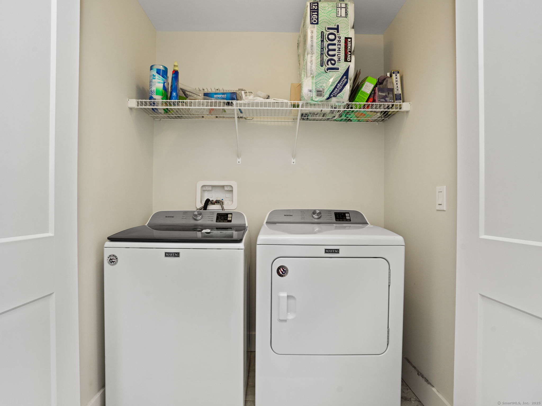 118 Berwick Avenue, Unit 118 Fairfield, CT 06825 - Photo 23 of 29 a utility room with dryer and washer