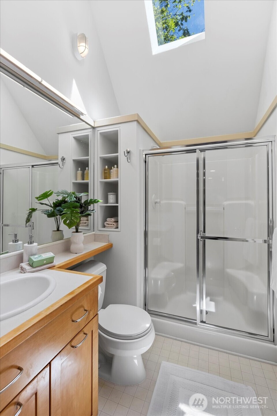 4309 Olympic Boulevard Everett, WA 98203 - Photo 18 of 40 a bathroom with a sink a toilet and shower