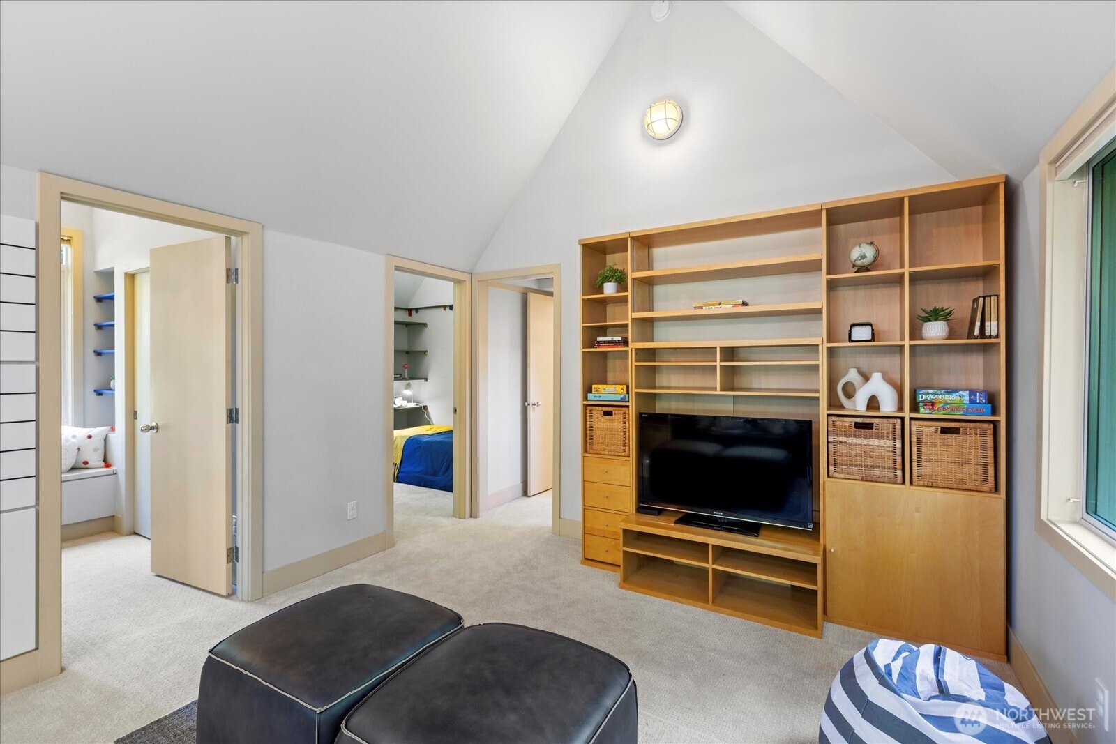 4309 Olympic Boulevard Everett, WA 98203 - Photo 22 of 40 a living room with furniture and a flat screen tv