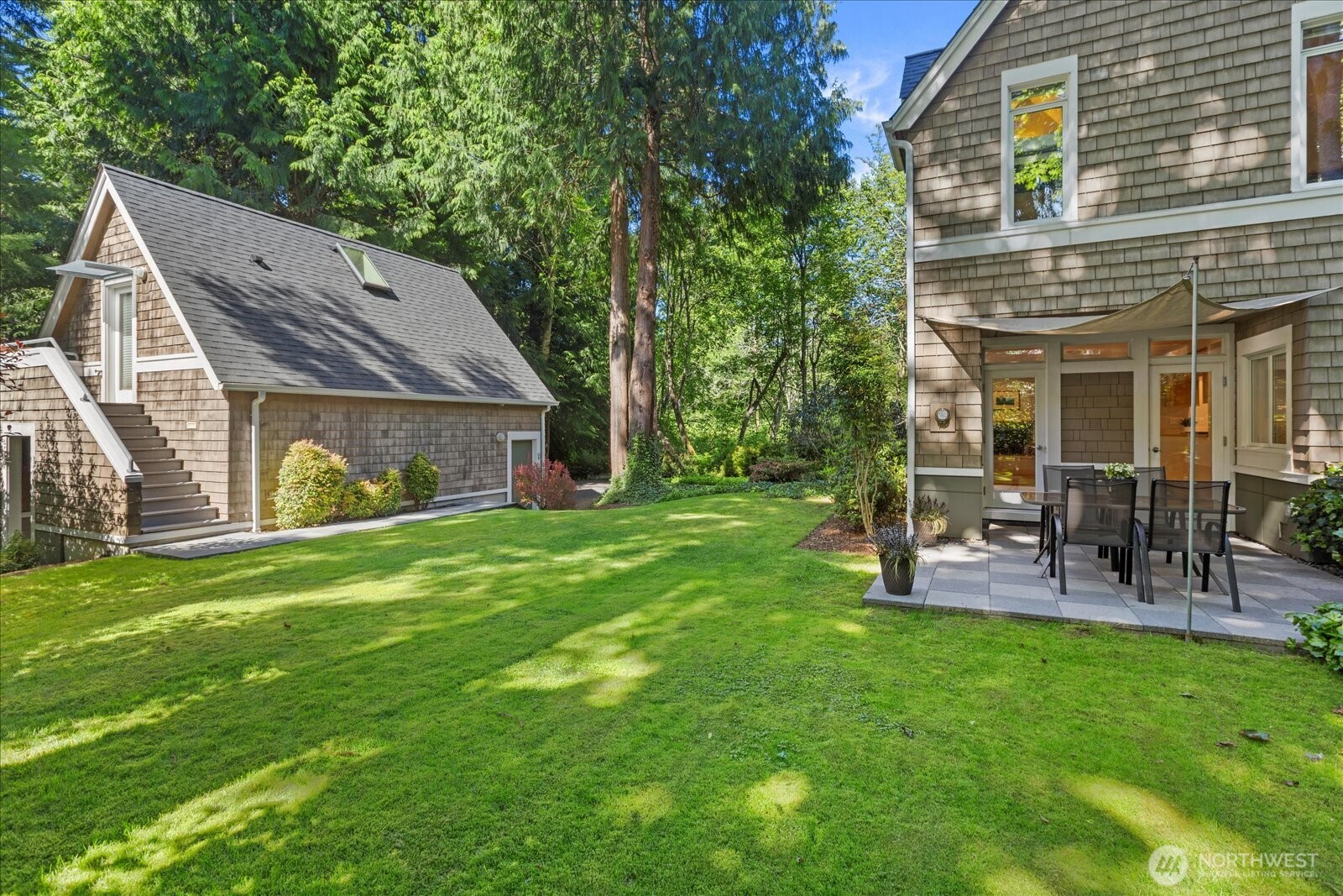 4309 Olympic Boulevard Everett, WA 98203 - Photo 35 of 40 a view of a house with a yard porch and sitting area