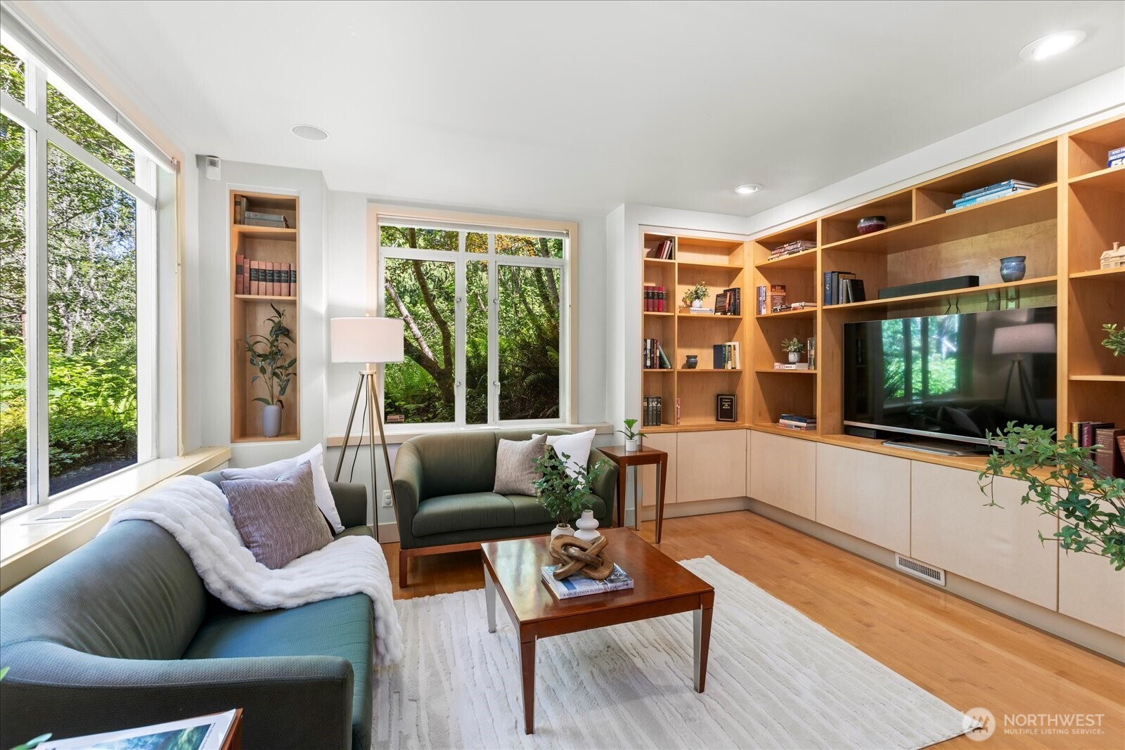 4309 Olympic Boulevard Everett, WA 98203 - Photo 5 of 40 a living room with furniture a flat screen tv and a large window