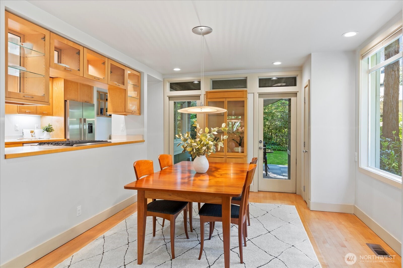 4309 Olympic Boulevard Everett, WA 98203 - Photo 9 of 40 a dining room with furniture a rug and a large window