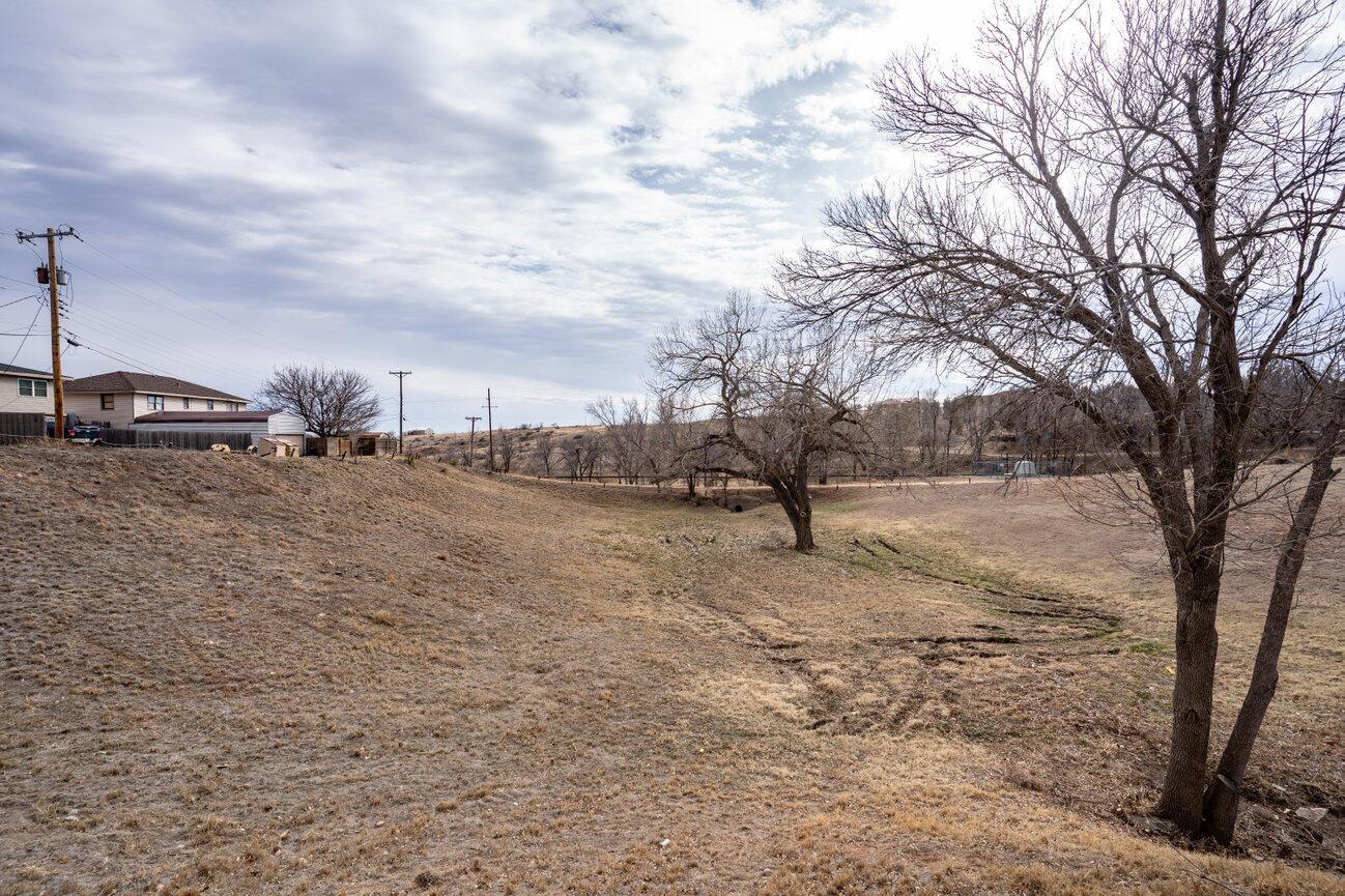 0 Primrose Lane Borger, TX 79007 - Photo 8 of 10 a view of dirt field with trees in the background