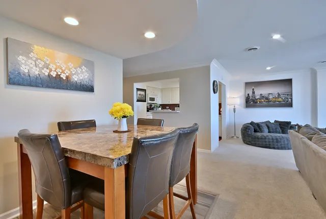 a view of a dining room with furniture