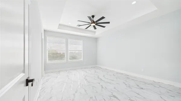 a spacious bathroom with a double vanity sink a mirror and a bathtub