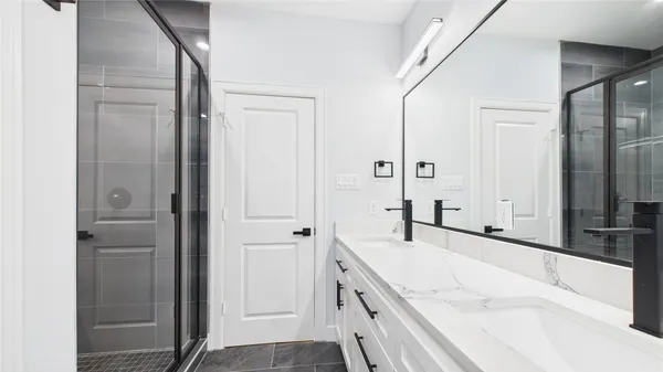a bathroom with a sink and a bathtub