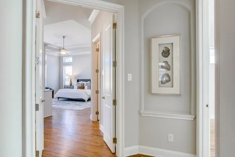 a view of a bedroom from a hallway