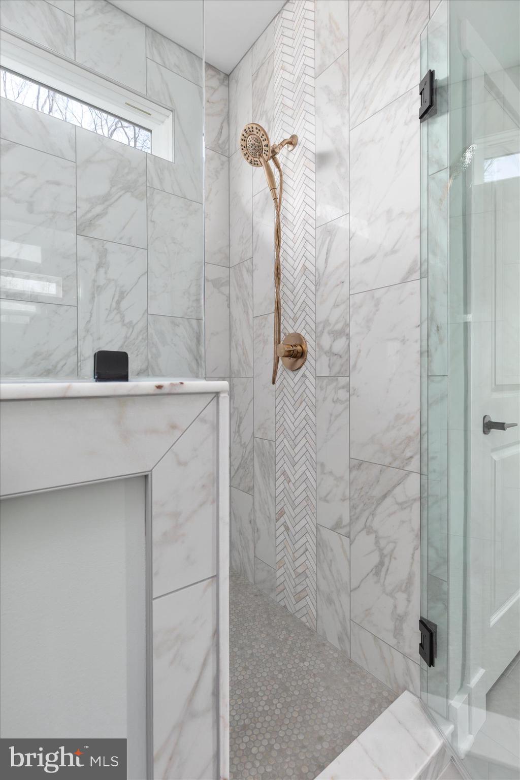 14305 Inlet Road Culpeper, VA 22701 - Photo 29 of 73 Stunning custom tiled shower with bench and niche