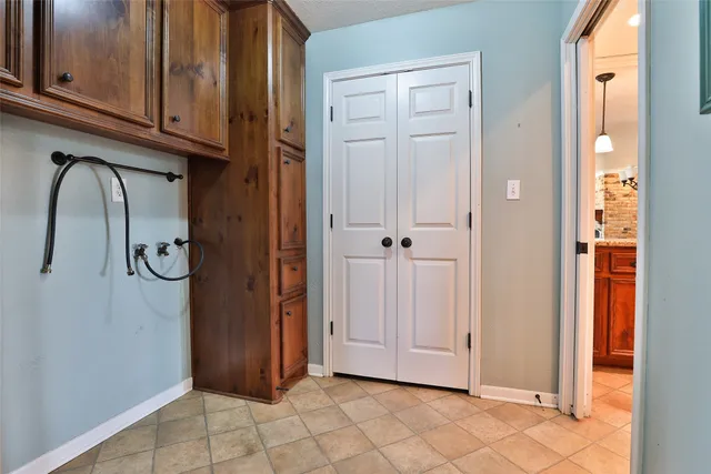 a view of an entryway with front door