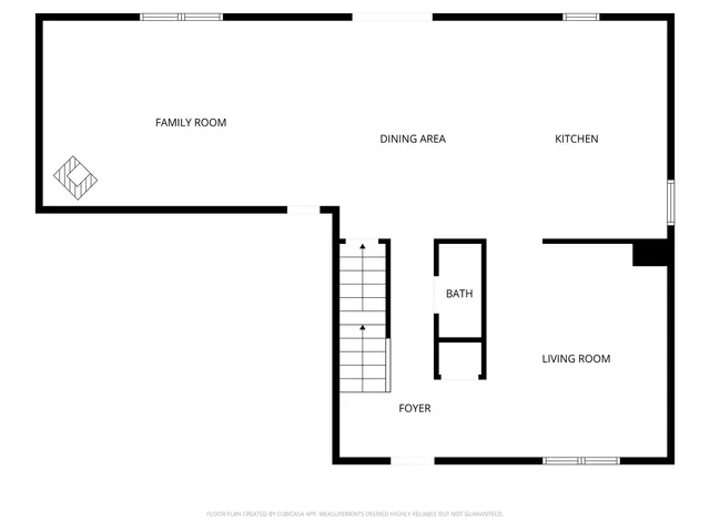 a picture of a wall with a white building and a painting