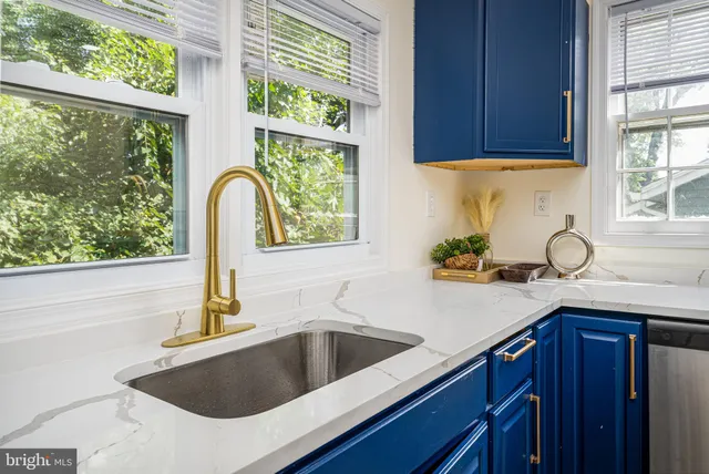 a view of a kitchen with washer and dryer