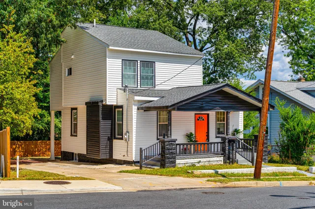 a view of a house with entertaining space and swimming pool