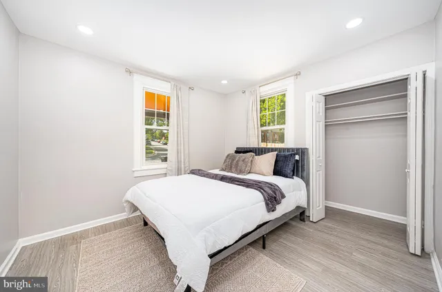 wooden floor in a hall with an entryway