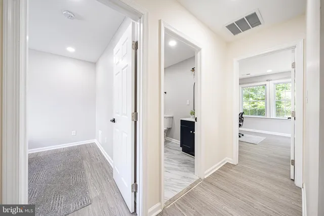 a view of livingroom and hardwood floor