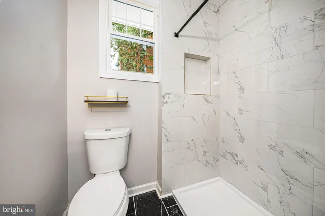 a view of a backyard of the house