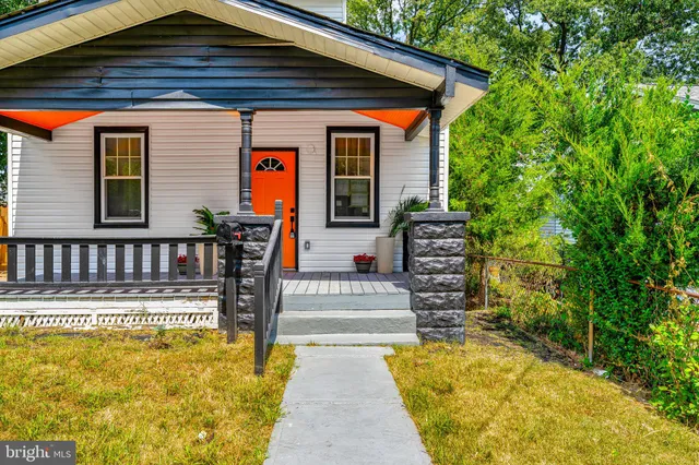 a balcony view with a seating space