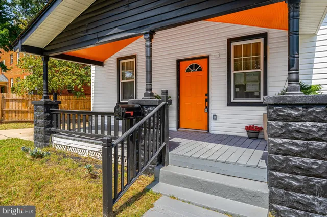 a view of a balcony with chairs