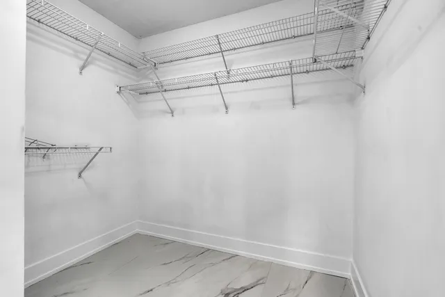 a view of a room with racks on the wall