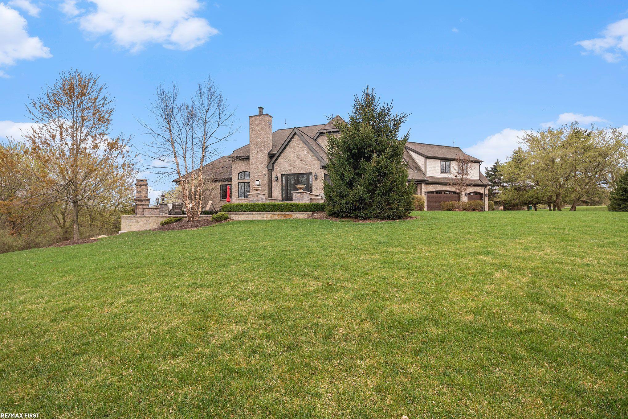 659 Foxwood Trail Rochester, MI 48306 - Photo 6 of 51 Side view of home