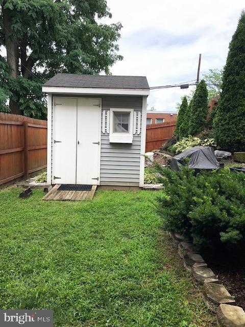 237 Lauriston Street Philadelphia, PA 19128 - Photo 22 of 22 a front view of a house with a garden