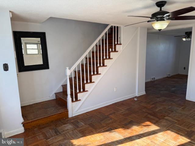 237 Lauriston Street Philadelphia, PA 19128 - Photo 3 of 22 a view of staircase with wooden floor and fan