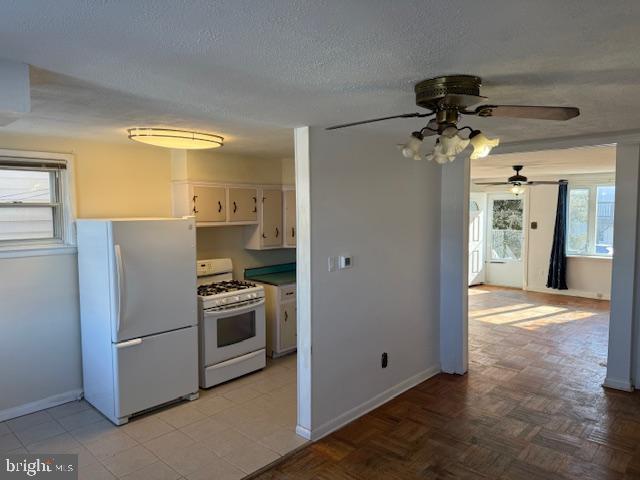 237 Lauriston Street Philadelphia, PA 19128 - Photo 7 of 22 a kitchen with stainless steel appliances granite countertop white cabinets and a refrigerator