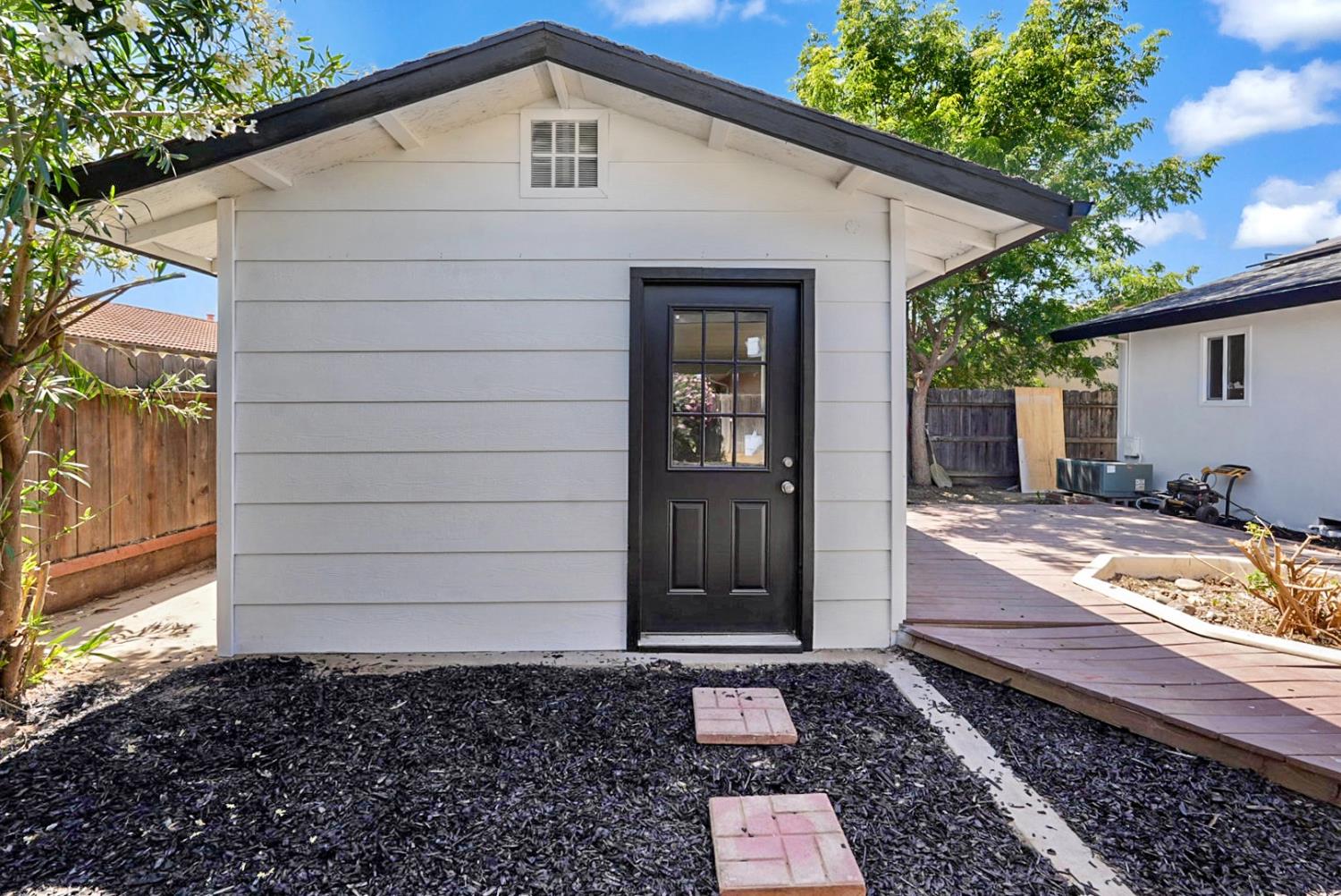 2832 Fowler Road Ceres, CA 95307 - Photo 17 of 28 a view of a house with a yard