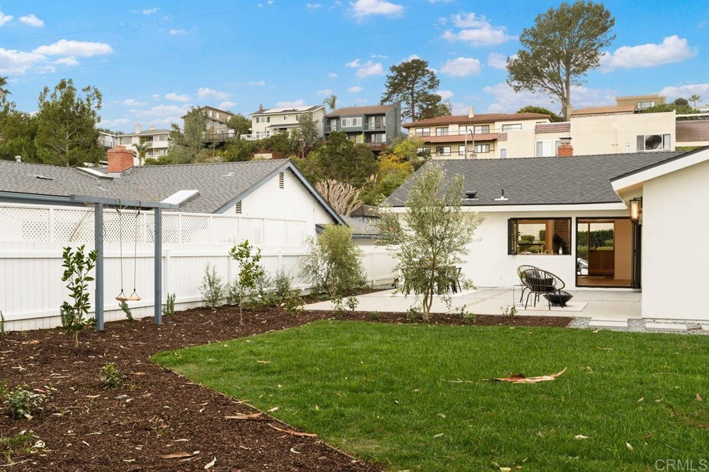 13705 Mango Drive Del Mar, CA 92014 - Photo 29 of 35 a view of house with a yard