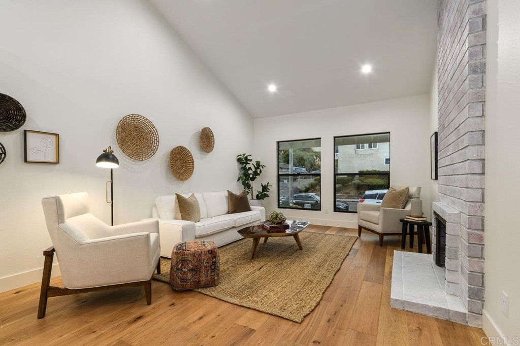 13705 Mango Drive Del Mar, CA 92014 - Photo 6 of 35 a living room with furniture and a large window