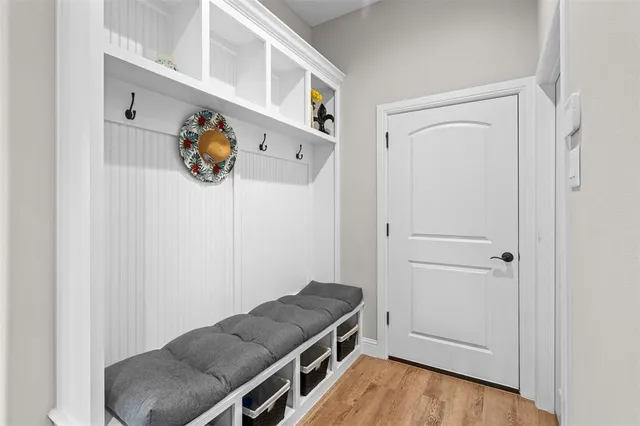 a view of cabinets with wooden floor