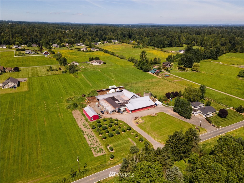 5495 Sand Road Bellingham, WA 98226 - Photo 3 of 40 an aerial view of residential houses with outdoor space