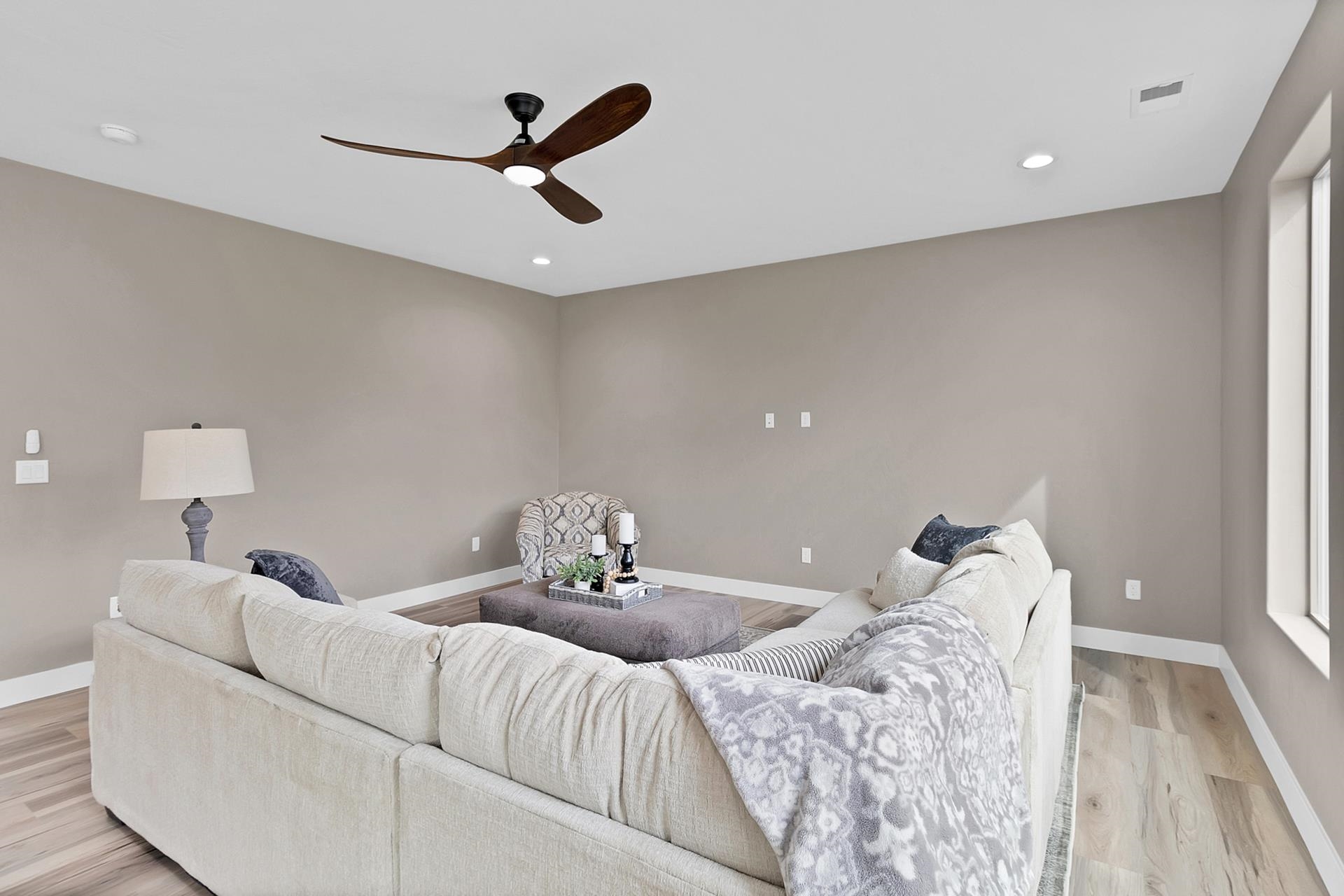 1124 Sprocket Court Fruita, CO 81521 - Photo 14 of 40 a living room with furniture and a wooden floor