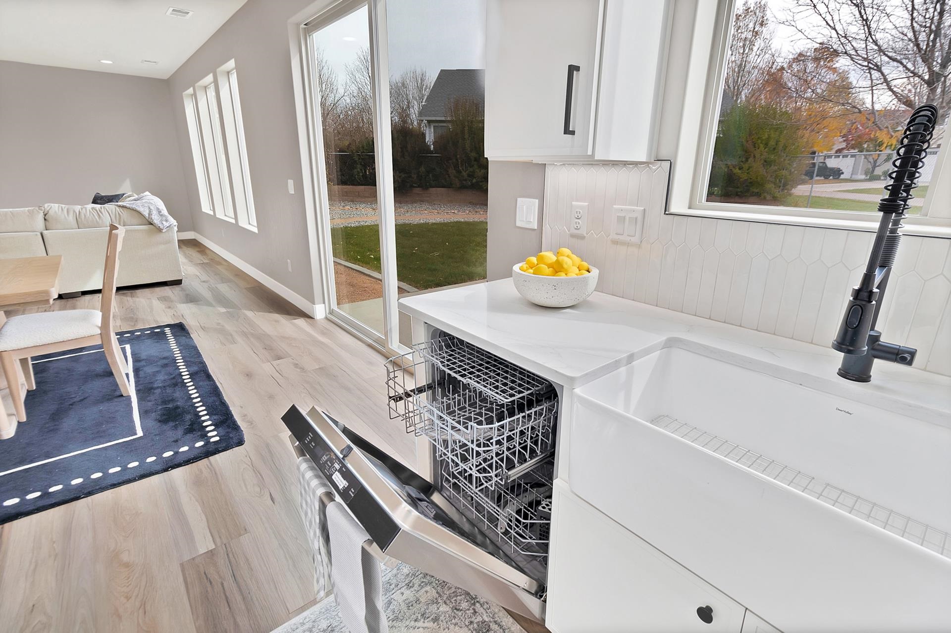 1124 Sprocket Court Fruita, CO 81521 - Photo 21 of 40 a kitchen with a sink stove and cabinets