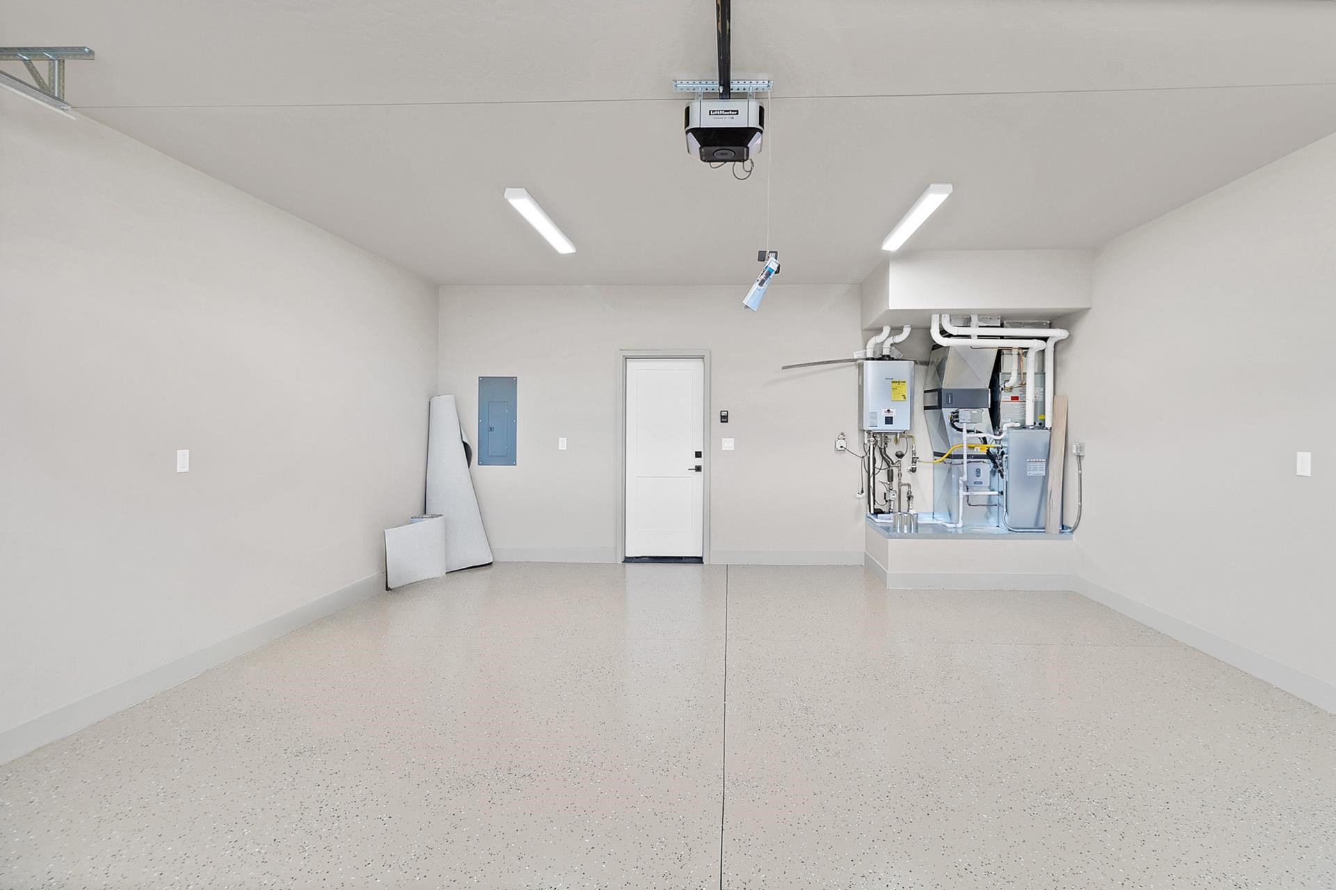1124 Sprocket Court Fruita, CO 81521 - Photo 27 of 40 an empty room with ceiling fan and windows