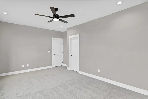 a view of an empty walk in closet