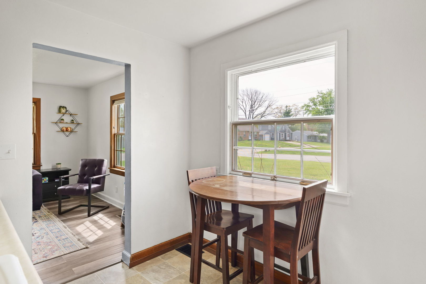 2330 39th Street Rock Island, IL 61201 - Photo 12 of 32 a dining room with furniture and a window