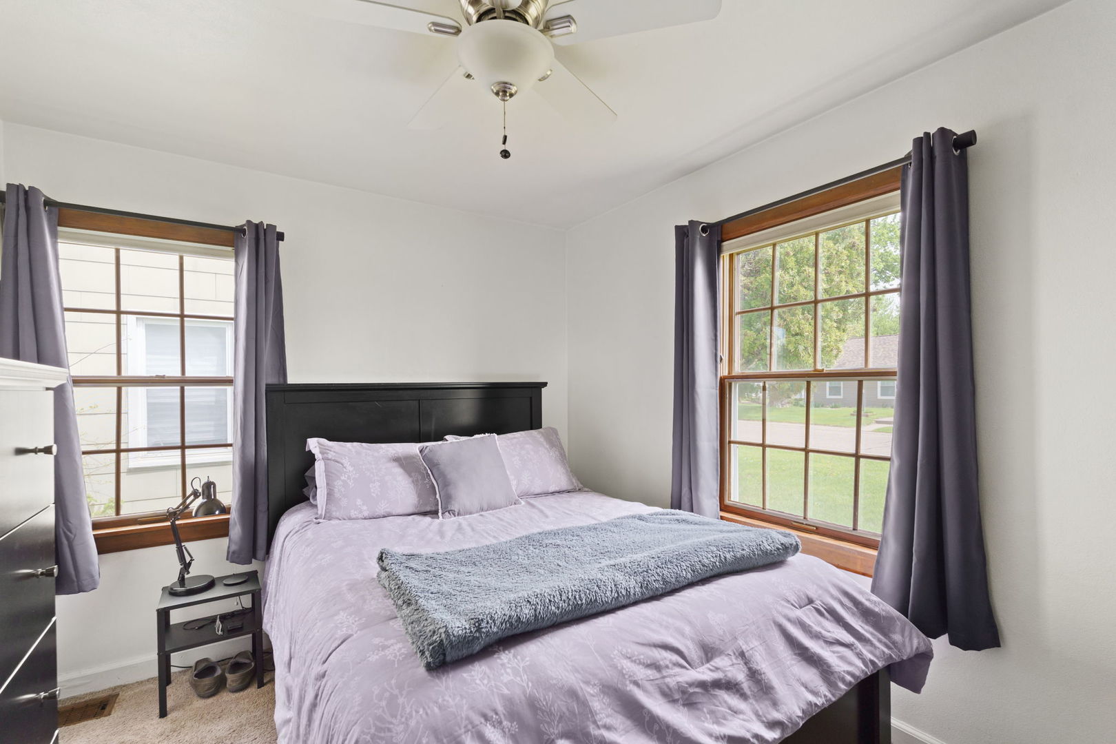 2330 39th Street Rock Island, IL 61201 - Photo 16 of 32 a bedroom with a large bed and a window