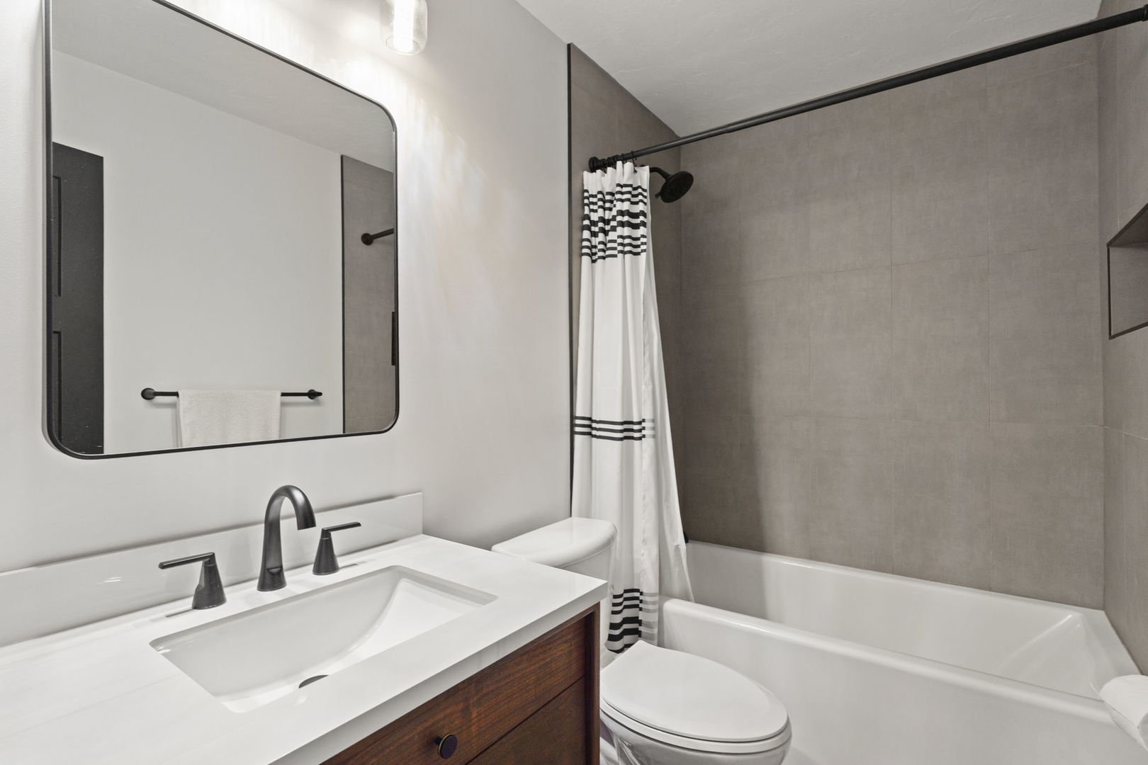 2330 39th Street Rock Island, IL 61201 - Photo 18 of 32 a bathroom with a sink toilet and shower