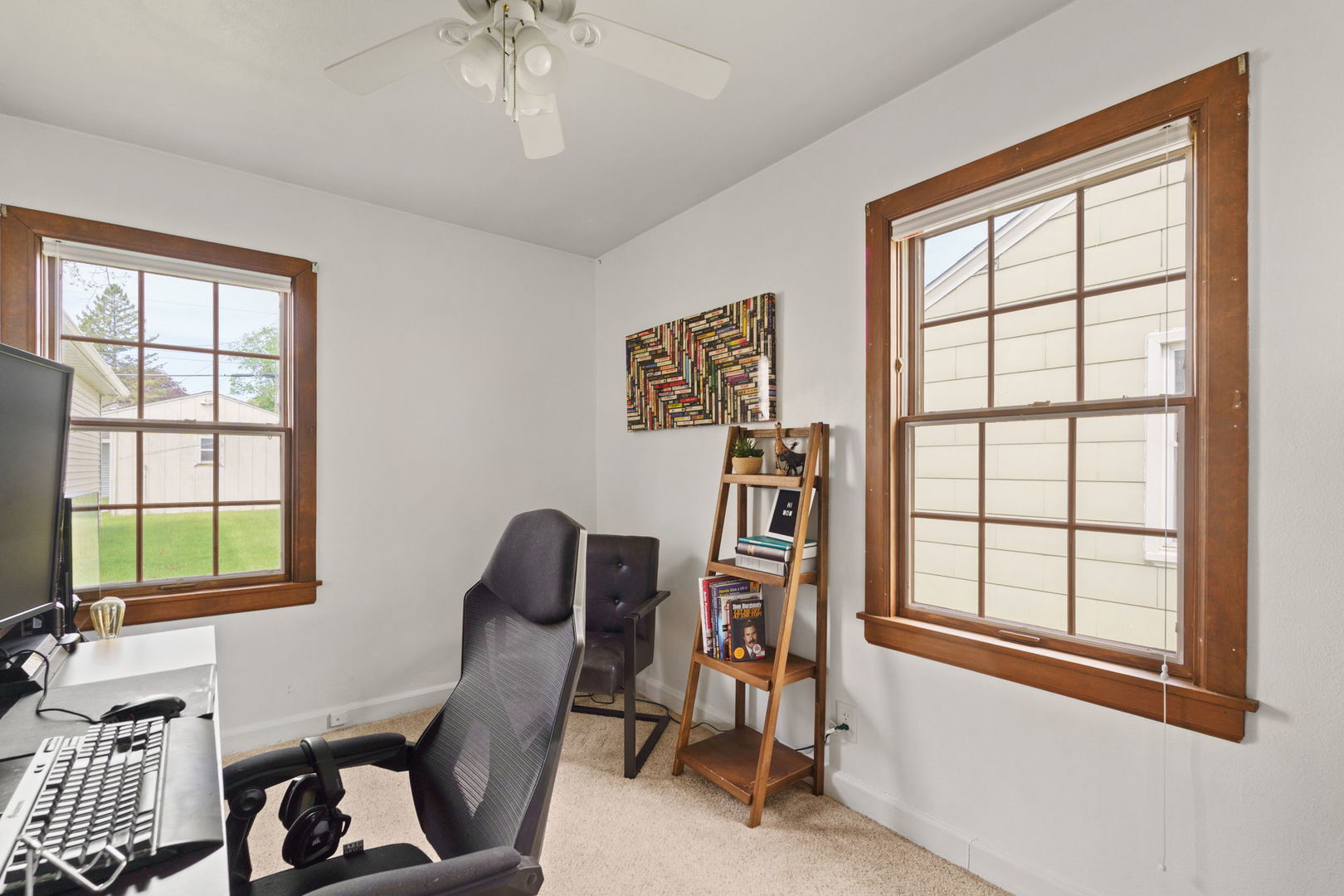 2330 39th Street Rock Island, IL 61201 - Photo 20 of 32 a workspace with windows and wooden floor