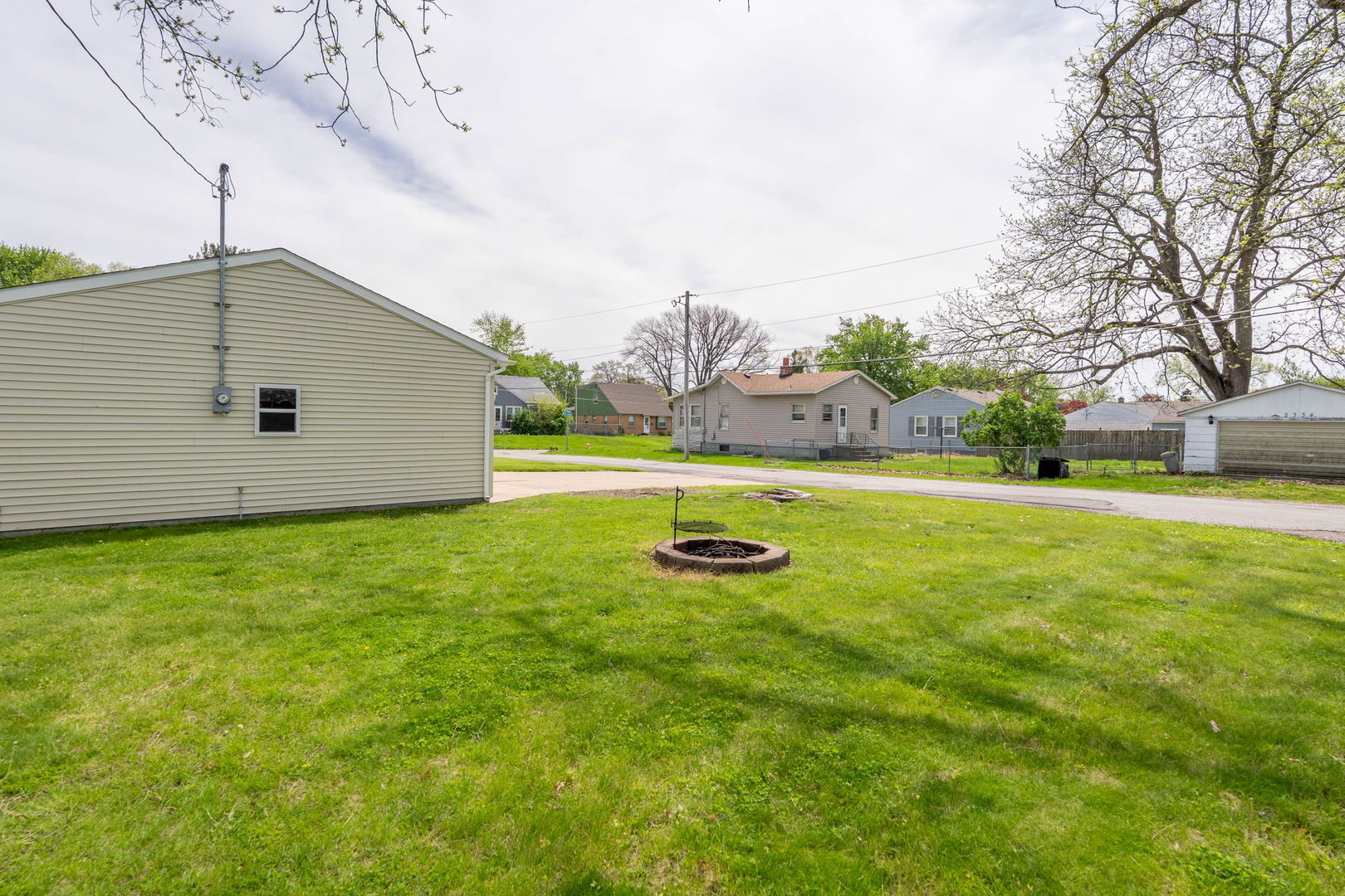 2330 39th Street Rock Island, IL 61201 - Photo 30 of 32 a view of yard with swimming pool and green space