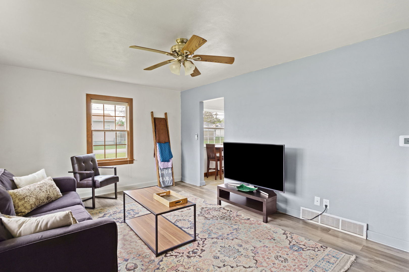 2330 39th Street Rock Island, IL 61201 - Photo 6 of 32 a living room with furniture and a flat screen tv