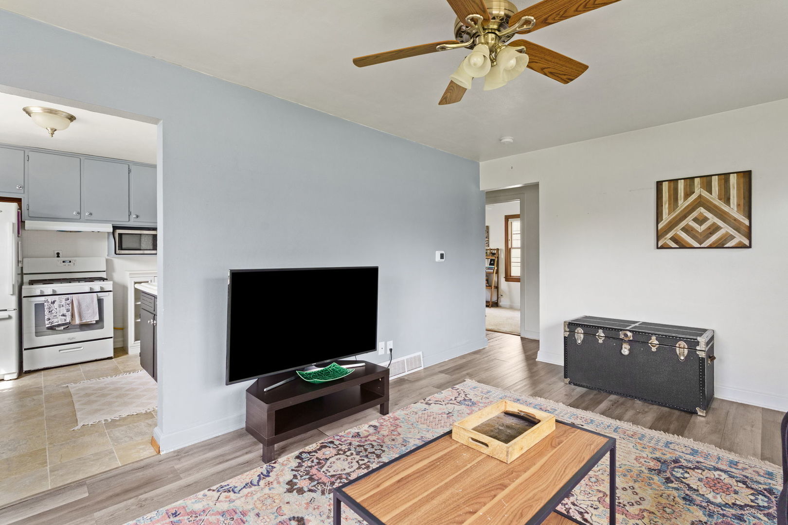 2330 39th Street Rock Island, IL 61201 - Photo 7 of 32 a living room with furniture and a flat screen tv
